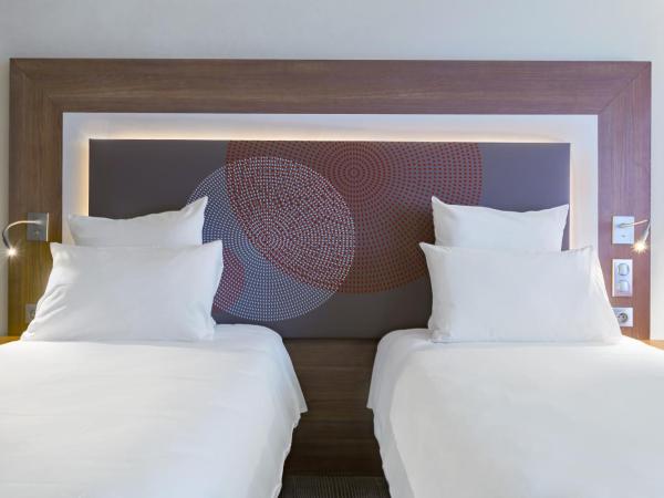 Novotel Katowice Centrum : photo 3 de la chambre chambre lits jumeaux exécutive