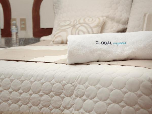 Global Express Puebla - FINSA : photo 2 de la chambre chambre double avec 2 lits doubles