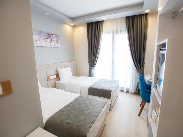 Royal İnci Hotel : photo 2 de la chambre chambre familiale deluxe