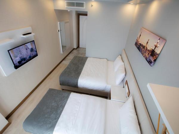 Royal İnci Hotel : photo 3 de la chambre chambre deluxe double ou lits jumeaux