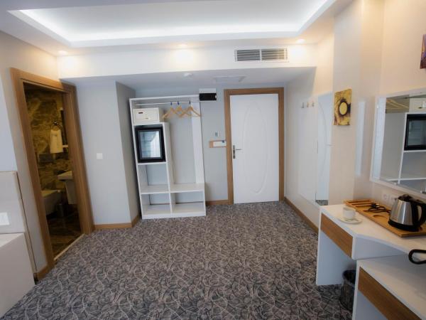 Royal İnci Hotel : photo 5 de la chambre suite familiale de luxe avec balcon