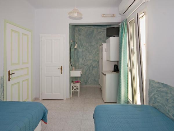 Fraskoula's Town : photo 4 de la chambre chambre lits jumeaux