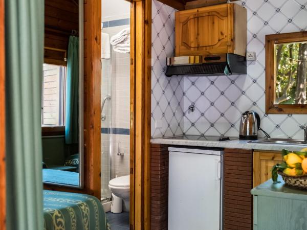 Residence Villaggio Verde : photo 3 de la chambre bungalow (4 adultes)