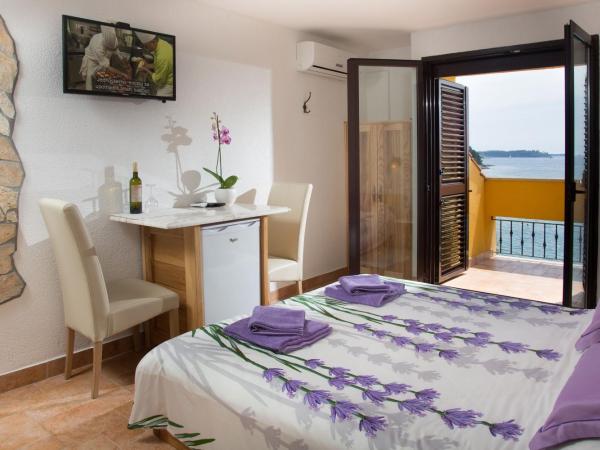 Rooms Figarola : photo 7 de la chambre chambre double avec balcon - vue sur mer