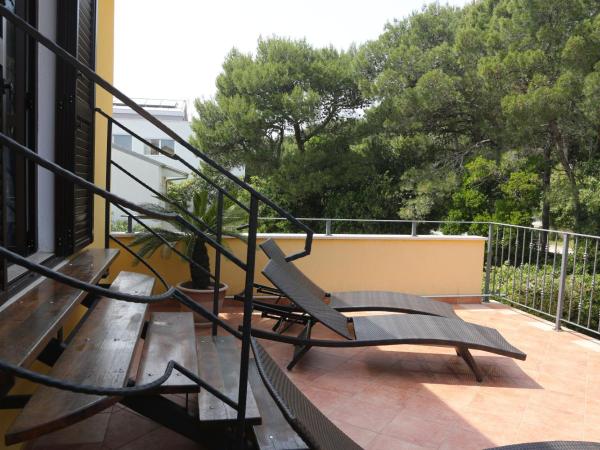 Rooms Figarola : photo 1 de la chambre chambre double avec terrasse - vue sur jardin