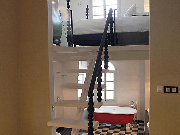 L'Alcazar : photo 1 de la chambre suite deluxe