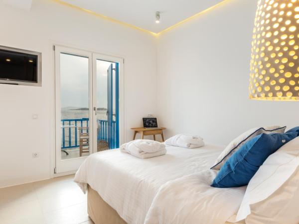 Bluetopia Suites : photo 1 de la chambre suite deluxe - vue sur mer