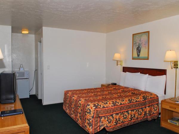 Stone Inn Extended Stay U of A : photo 1 de la chambre chambre lit queen-size - fumeurs