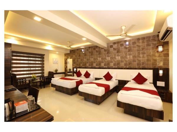 Hotel Kochi Caprice : photo 1 de la chambre chambre familiale deluxe