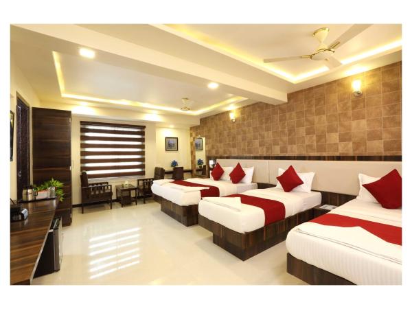 Hotel Kochi Caprice : photo 3 de la chambre chambre familiale deluxe