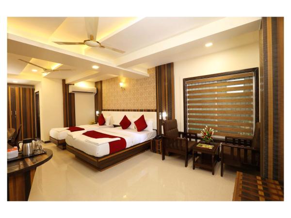 Hotel Kochi Caprice : photo 1 de la chambre chambre triple deluxe
