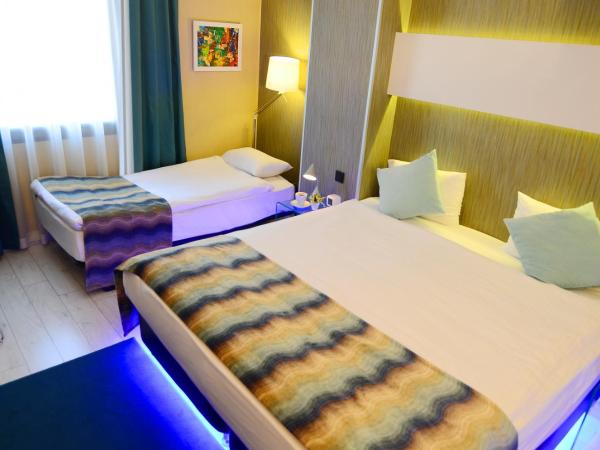 Tempo Hotel 4Levent : photo 3 de la chambre chambre double standard avec lit d'appoint