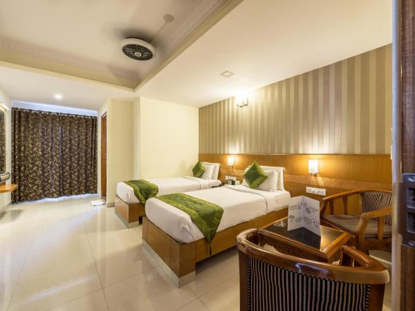 Treebo Akshaya Lalbagh Inn : photo 3 de la chambre [sanitized] standard  double room