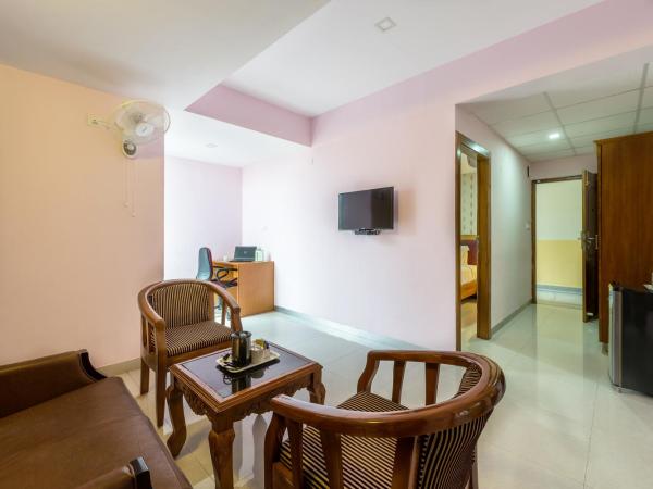 Treebo Akshaya Lalbagh Inn : photo 7 de la chambre [sanitized] deluxe double room