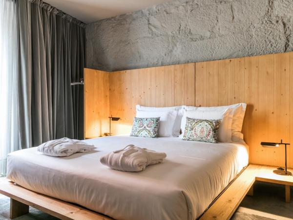 Armazém Luxury Housing- Architectural & Design Hotel : photo 1 de la chambre suite