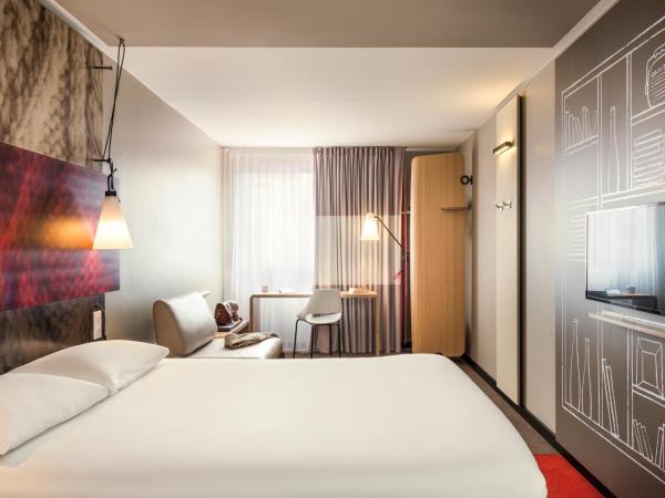 ibis Paris Place d'Italie 13ème : photo 1 de la chambre chambre double standard avec canapé