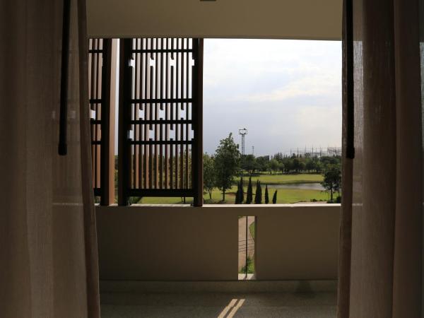 Hyde Park Chiangmai : photo 8 de la chambre chambre de luxe avec vue sur le parc