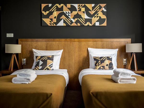 Zulian Aparthotel by Artery Hotels : photo 6 de la chambre chambre quadruple avec vue sur la ville