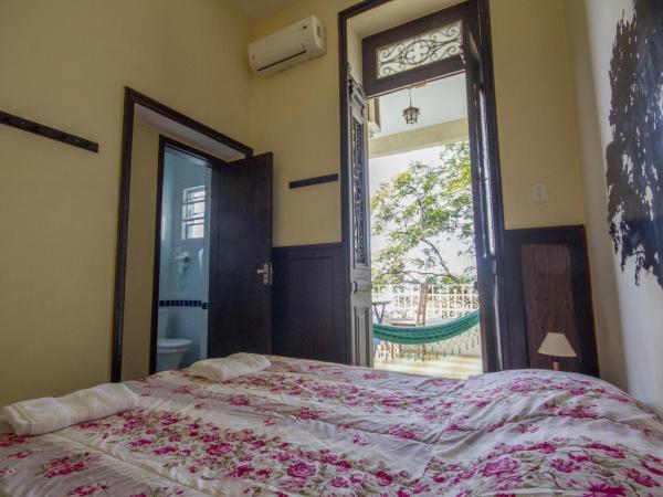 Rio Forest Hostel : photo 1 de la chambre suite avec balcon