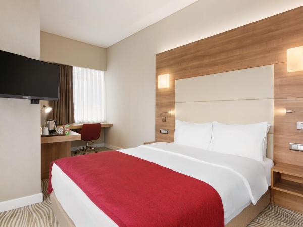Ramada Encore Istanbul Kartal : photo 2 de la chambre chambre lit queen-size affaires - non-fumeurs