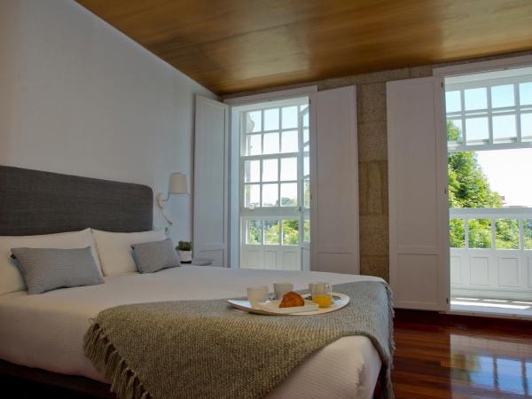 Pensión O Xardin de Julia : photo 2 de la chambre chambre double - vue sur jardin