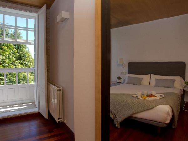 Pensión O Xardin de Julia : photo 7 de la chambre chambre double - vue sur jardin