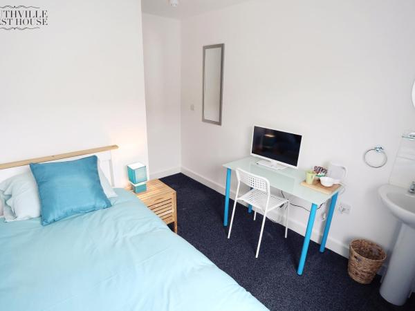 Southville Guest House : photo 10 de la chambre chambre simple avec salle de bains commune