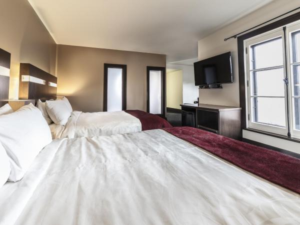 Hôtel Sainte-Anne : photo 4 de la chambre suite junior avec 2 lits