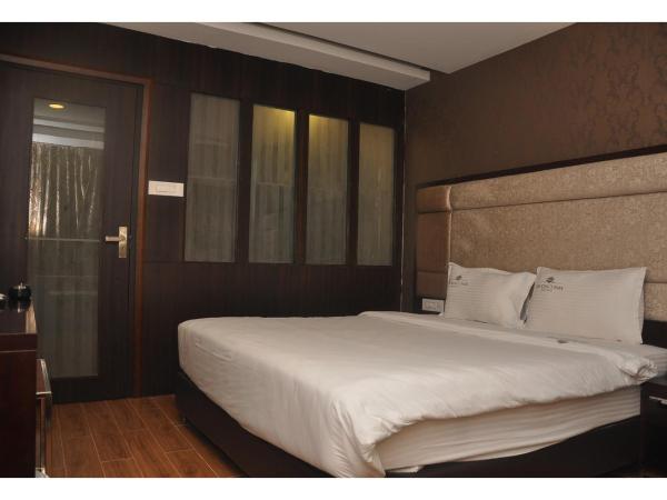 The Kings Park Residency : photo 1 de la chambre suite lit king-size