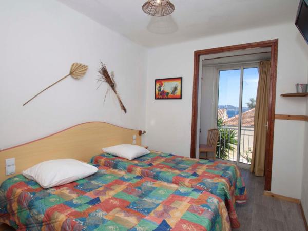 Hôtel La Croix de Malte : photo 1 de la chambre chambre lits jumeaux