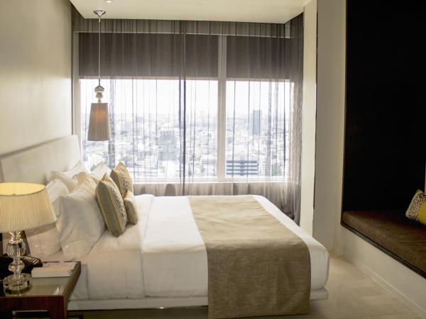 Mode Sathorn Hotel - SHA Extra Plus : photo 1 de la chambre suite 1 chambre