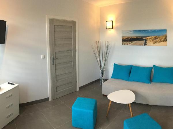 Panorama Gdynia Rooms : photo 1 de la chambre chambre quadruple - vue sur jardin