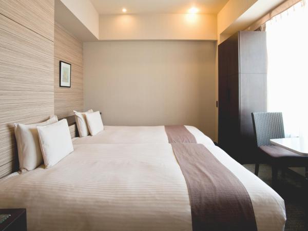 Citadines Central Shinjuku Tokyo : photo 1 de la chambre chambre lits jumeaux exécutive