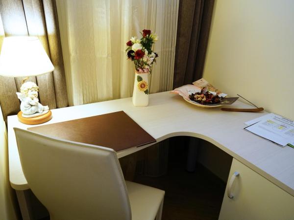 B&B President's Home : photo 8 de la chambre chambre double ou lits jumeaux avec lit d'appoint