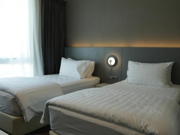 Amerin Hotel Johor Bahru : photo 5 de la chambre chambre lits jumeaux deluxe