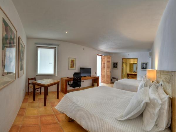 Hotel Boutique Casareyna : photo 5 de la chambre chambre deluxe avec 2 lits queen-size