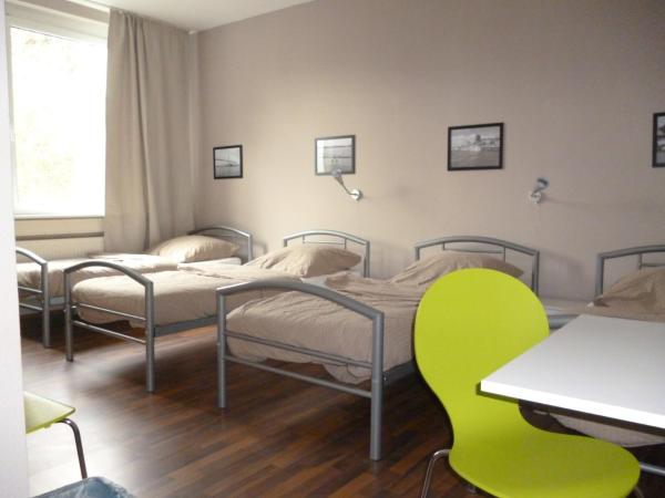 Bergedorf Haus 9 : photo 1 de la chambre chambre quadruple avec salle de bains commune