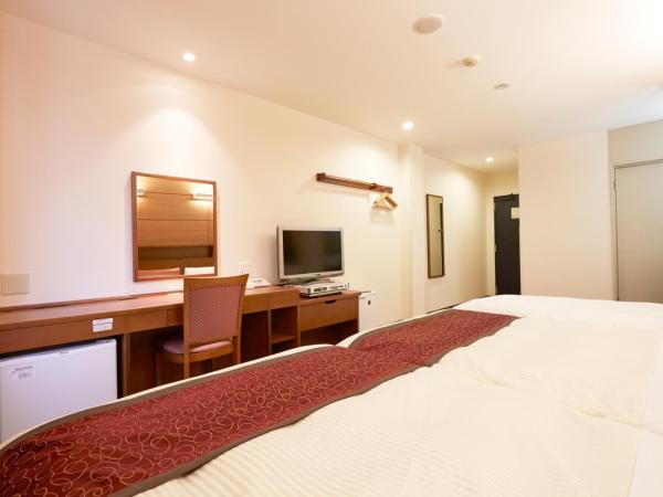 Vessel Hotel Fukuoka Kaizuka : photo 3 de la chambre chambre lits jumeaux avec lit d'appoint - non-fumeurs