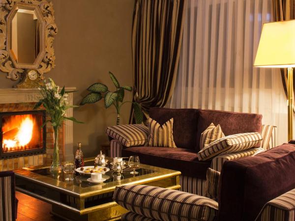 Hôtel de la Cigogne : photo 5 de la chambre suite avec lit queen-size