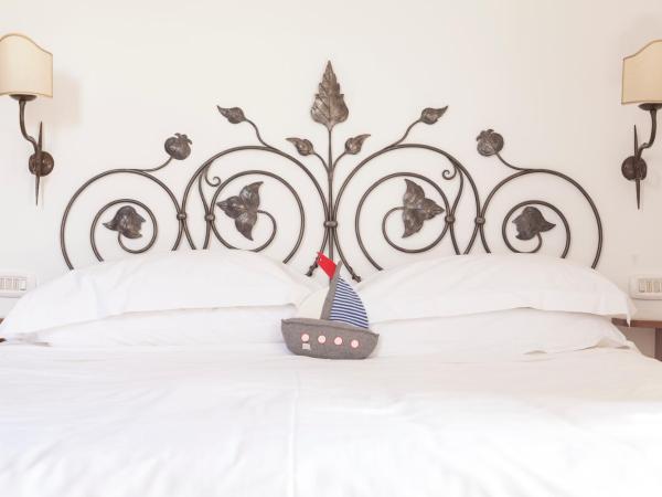 Relais Regina Giovanna : photo 3 de la chambre chambre familiale (3 adultes + 1 enfant)