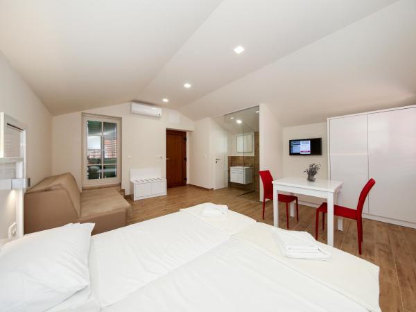 Idassa Atrium rooms : photo 4 de la chambre chambre double ou lits jumeaux avec balcon
