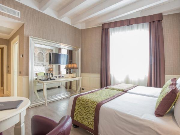 Hotel San Pietro : photo 7 de la chambre chambre familiale deluxe