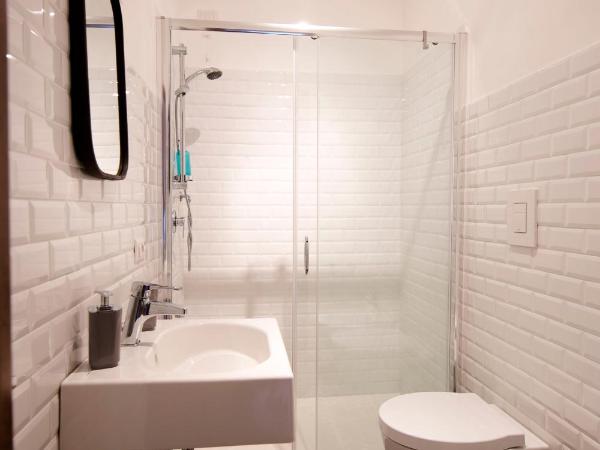 I Quattro Gattoni : photo 5 de la chambre chambre quadruple avec salle de bains privative