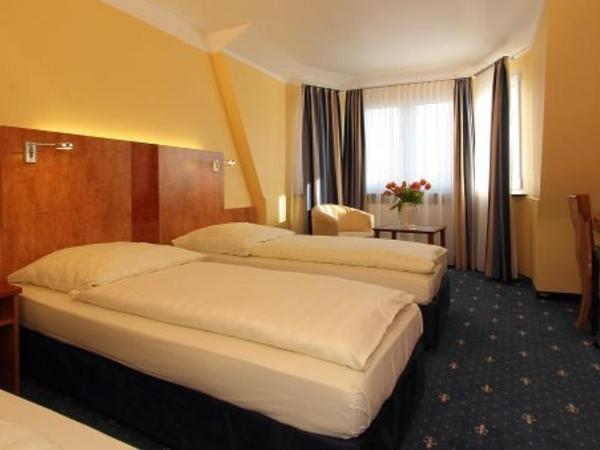 Aparthotel Astro - Nichtraucherhotel : photo 2 de la chambre chambre triple