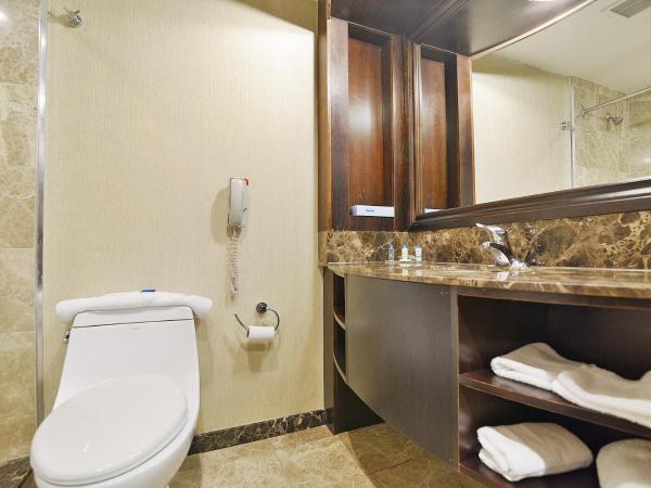 Woodbine Hotel & Suites : photo 2 de la chambre chambre double avec 2 lits doubles