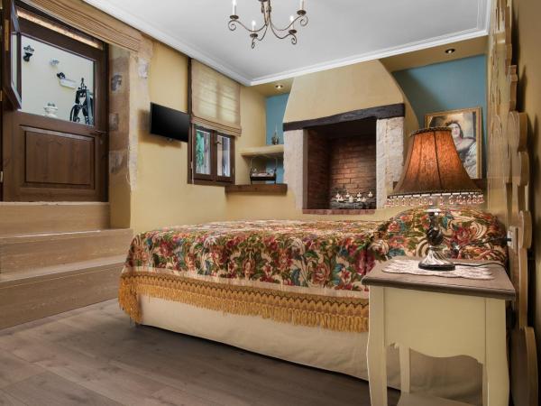 Cretan Renaissance : photo 9 de la chambre suite avec baignoire spa - vue sur jardin (panorea)