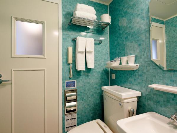 Hotel Monterey La Soeur Fukuoka : photo 4 de la chambre chambre lits jumeaux standard avec lit d'appoint - non-fumeurs