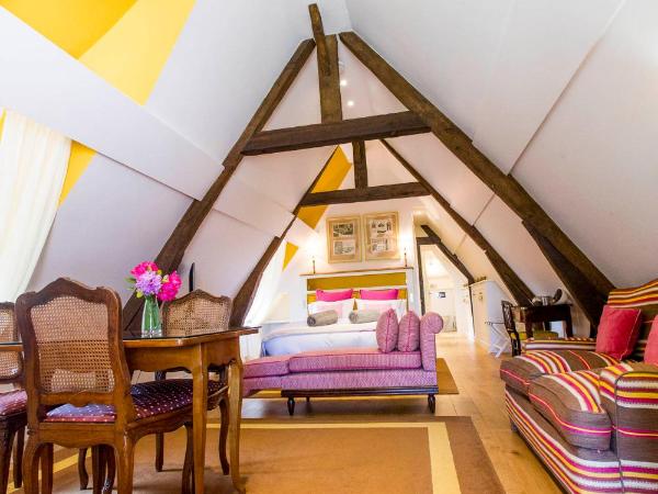 Le Clos de Grâce : photo 5 de la chambre chambre triple confort avec kitchenette