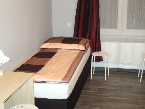 Hostel Kamienna Centrum : photo 1 de la chambre chambre triple