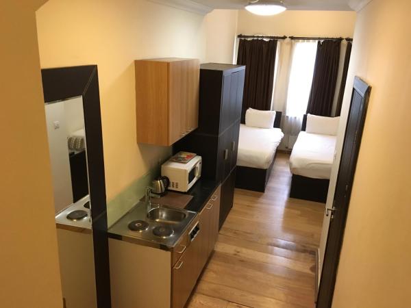 The Royale Chulan Hyde Park Hotel : photo 1 de la chambre chambre triple